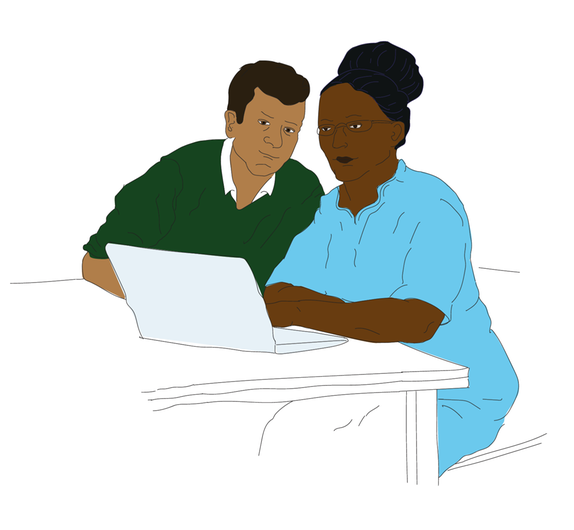 En man och en kvinna sitter framför en laptop och planerar lektioner.